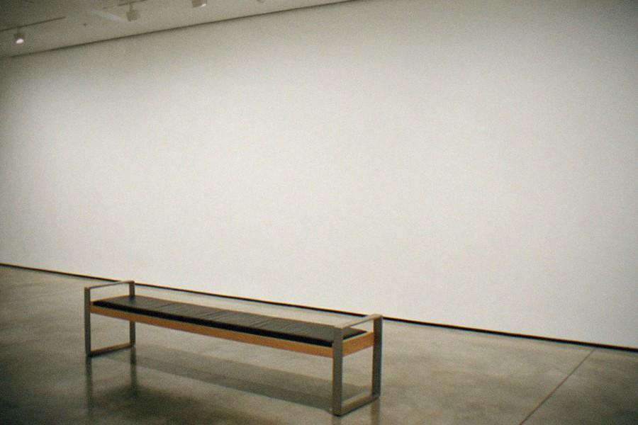 Gallery interior with large contemporary paintings on white walls