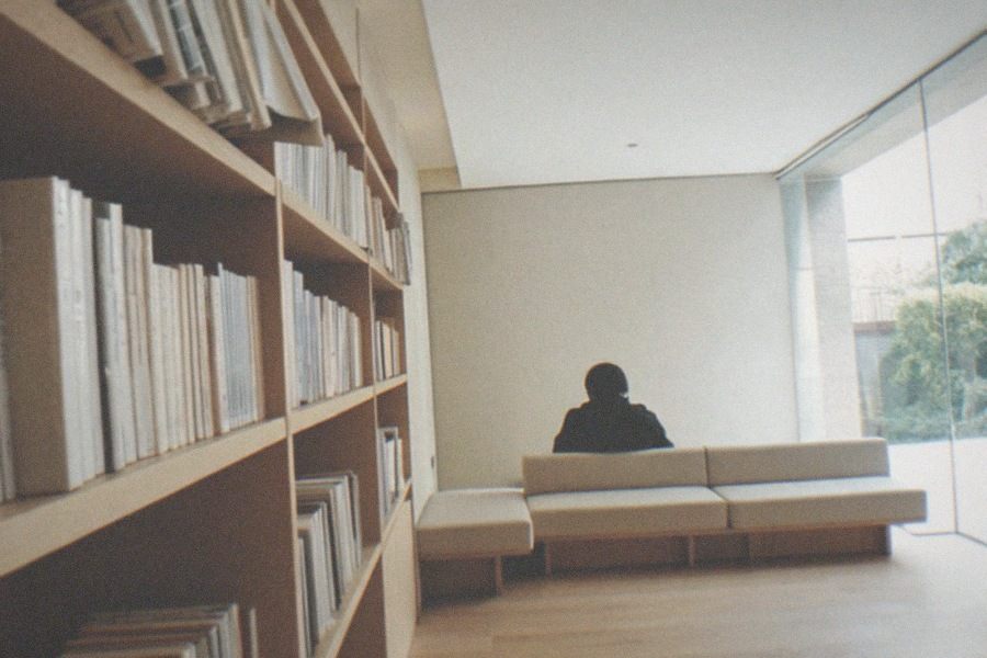 A contemporary gallery inside the Hammer Museum with large-scale artwork on the walls and visitors viewing the room